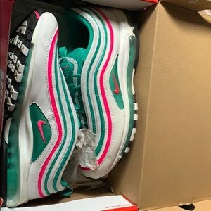 White and green and pink nike